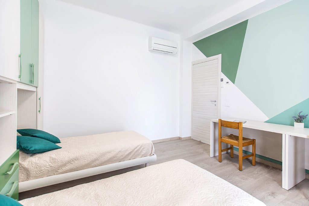 Era da letto con due letti singoli
