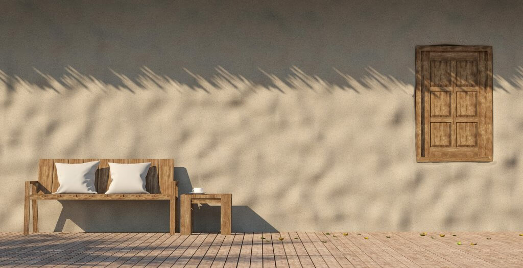 Pavimenti e rivestimenti terrazzo: idee e consigli | Facile Ristrutturare Giardino con panchina, mobile e pavimento in legno con cuscini bianchi